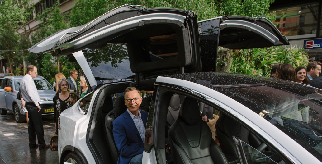 A patron samples the electric cars on offer as part of the Future Street. Image: WE-EF.