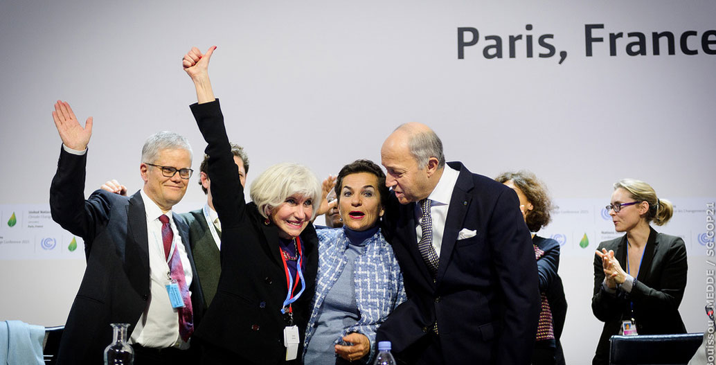 Delegates of COP23 pictured on receiving news that the Paris Agreement was signed.
