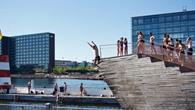 Copenhagen residents enjoy the Islands Brygge Harbour Bath, designed by BIG and JDS Architects.