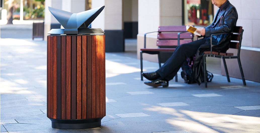 Monsoon Round Bin with protective roof, battened body and castings in sleek Sable Black.
