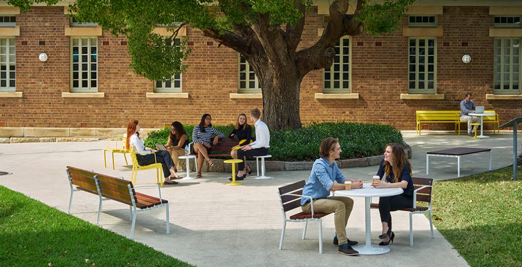 Moveable Forum Seats paired with colourful Cafe Tables and Stools create a friendly place to relax in social groups.