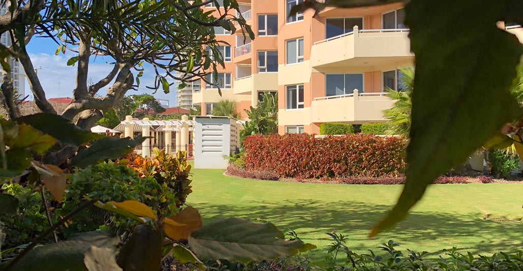 Subtropical gardens and generous open spaces are a feature of 1970s Gold Coast developments.