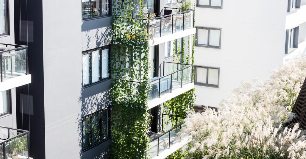 Plants tumble from balconies to add to a unified sense of green. Image: Brett Boardman