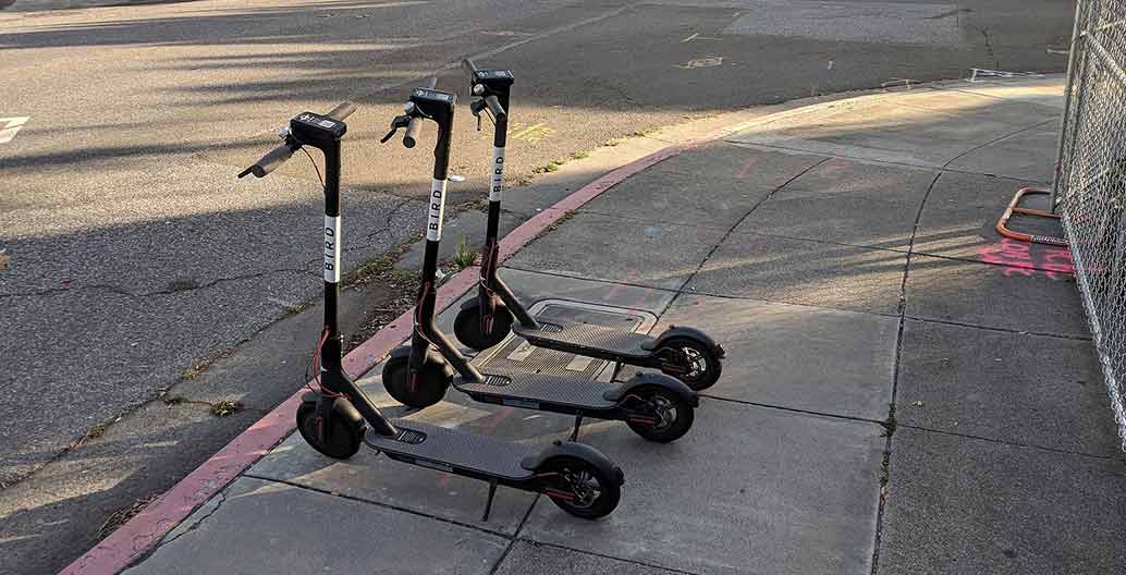 Bird electric share scooters on the footpath in San Jose, California.