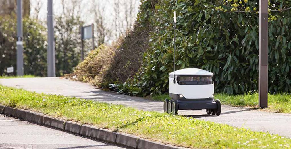 A Starship robot delivery unit on the footpath.