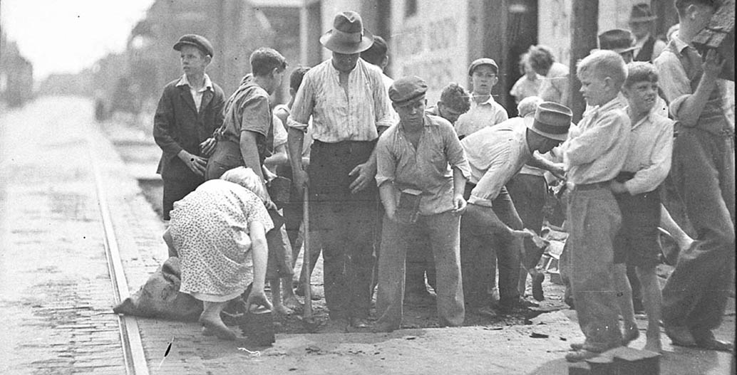 'Block boys' at St Peters, retrieving discarded wooden blocks Image: Sam Hood, courtesy State Library of NSW.