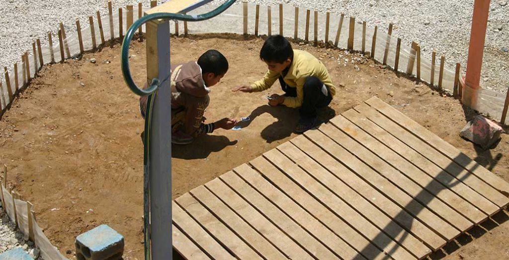 A playground, however informal and temporary, is immediately put to good use.