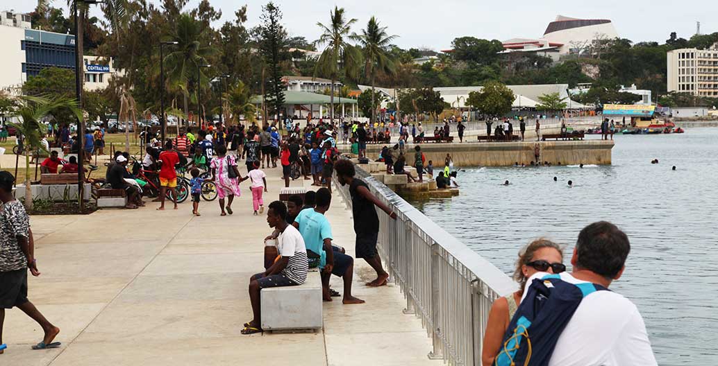 Port Vila seafront is a place for both tourists and locals to gather. Image: BECA
