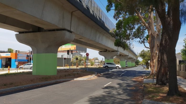 Elevated rail connects neighbourhoods and frees space for shared public use.