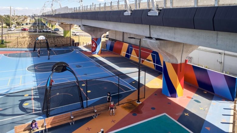 Strong colours and bold graphics identify the plazas of each sky rail precinct.