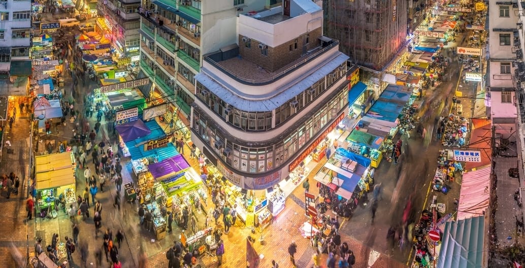 Road infrastructure can serve vibrant urban streetlife. Hong Kong. Photo: Steven Wei
