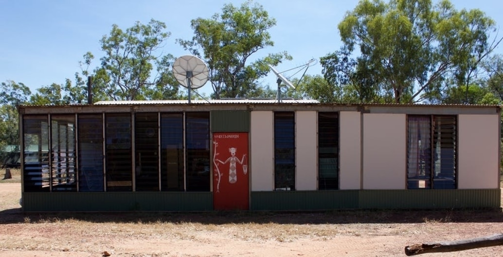 Ecosystem services paid for the self-built office at Kabulwarnamyo which includes doors painted with totems in the traditional X-ray style. Photo: Hannah Robertson