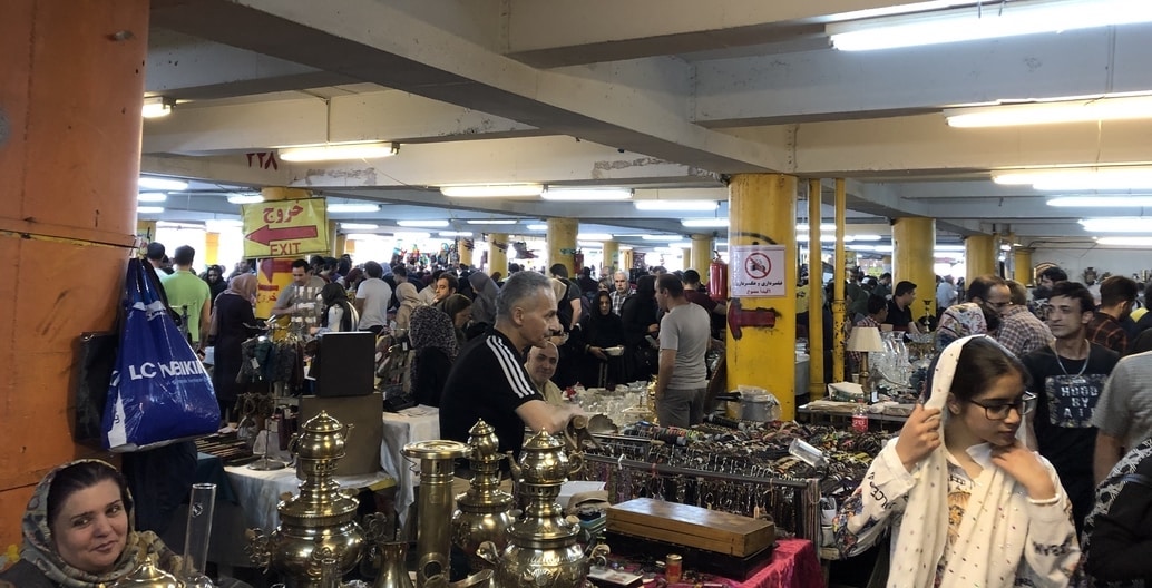 Every Friday, a multi-storey car park in Tehran transforms into the bustling Jomeh Bazaar market. The market hosts stall owners from all across the country and Central Asia. Photo: Tahj Rosmarin