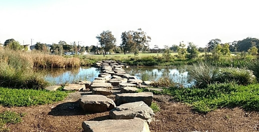 Broad stepping stones cross the easternmost wetland ponds at Felixstowe. Photo: Jo Russell-Clarke
