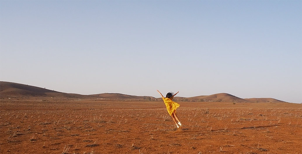 Dancer and choreographer Amrita Hepi moves in the landscape – part of a video installation produced with Claire Winsor funded by the TCL Kevin Taylor Legacy. Image: videographer Peter Drew