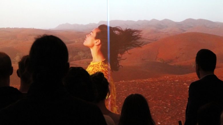 Amrita Hepi on screen. Video installation Movement of Place, produced as part of the Kevin Taylor Legacy. Image supplied