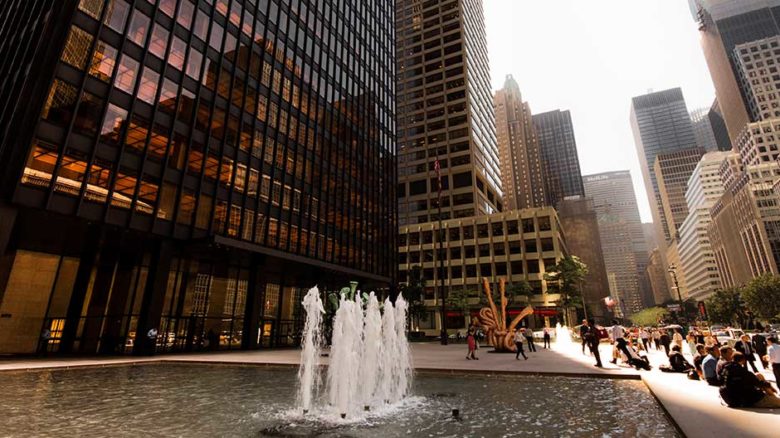 The forecourt of the Seagrams Building - the quintessential privately-owned public space. Image: Alex Schwab (cropped)