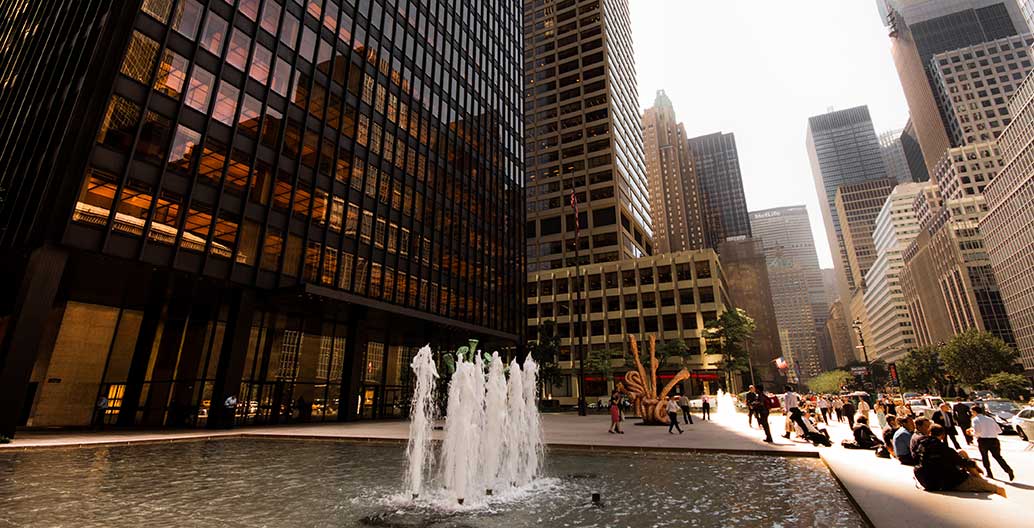 The forecourt of the Seagrams Building - the quintessential privately-owned public space. Image: Alex Schwab (cropped)