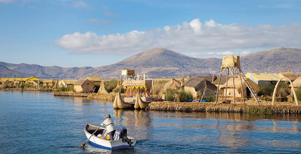 A floating island system on Lake Titicaca in Peru inhabited by the Uros, who build their entire civilization from the locally grown totora reed. Photo: © Enrique Castro-Mendivi