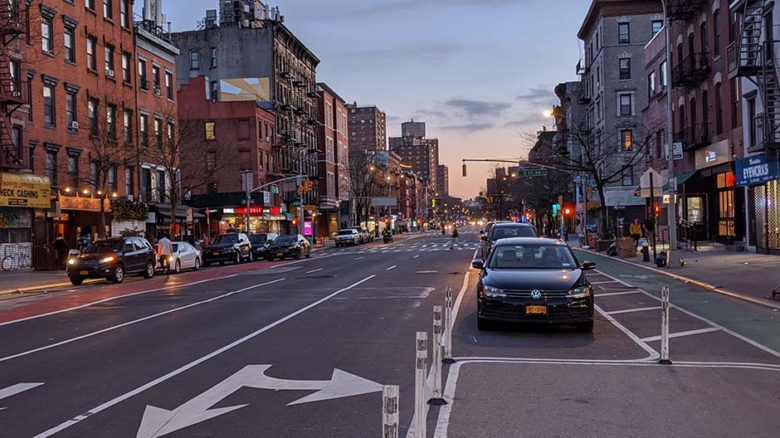 First Avenue, NYC (here devoid of cars during peak hour) has the safest configuration of car and cycling lanes. Image: Eden, Janine and Jim.