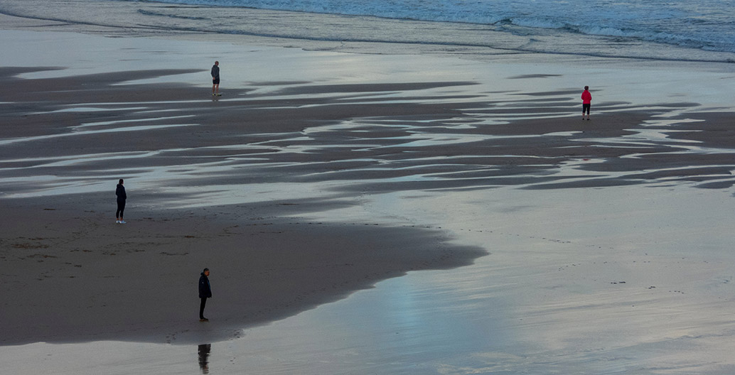 Social distancing, seen here on a British beach, has not been taken seriously by enough Australians. Image: Nick Fewings.