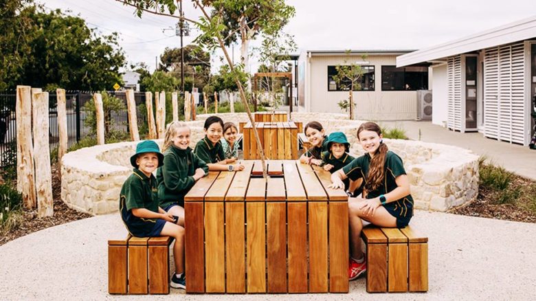 Students at Paringa Park Primary School sit at a kid-sized table. Image: Jason Tyndall