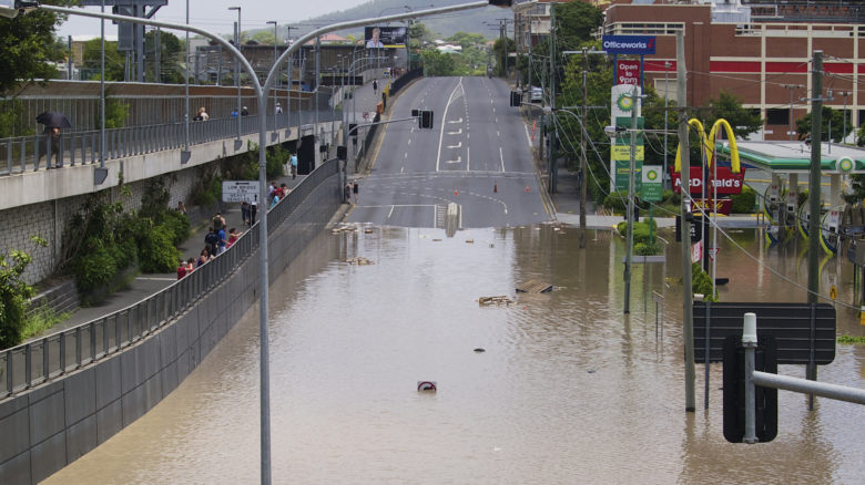 A flooded Milton Road, in the heart of Brisbane, during the 2011 floods. Image: Erik Veland