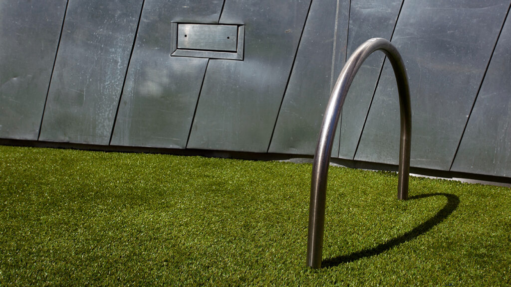 Bicycle stand on fake grass, Federation Square, Melbourne, Victoria, Australia (2009).