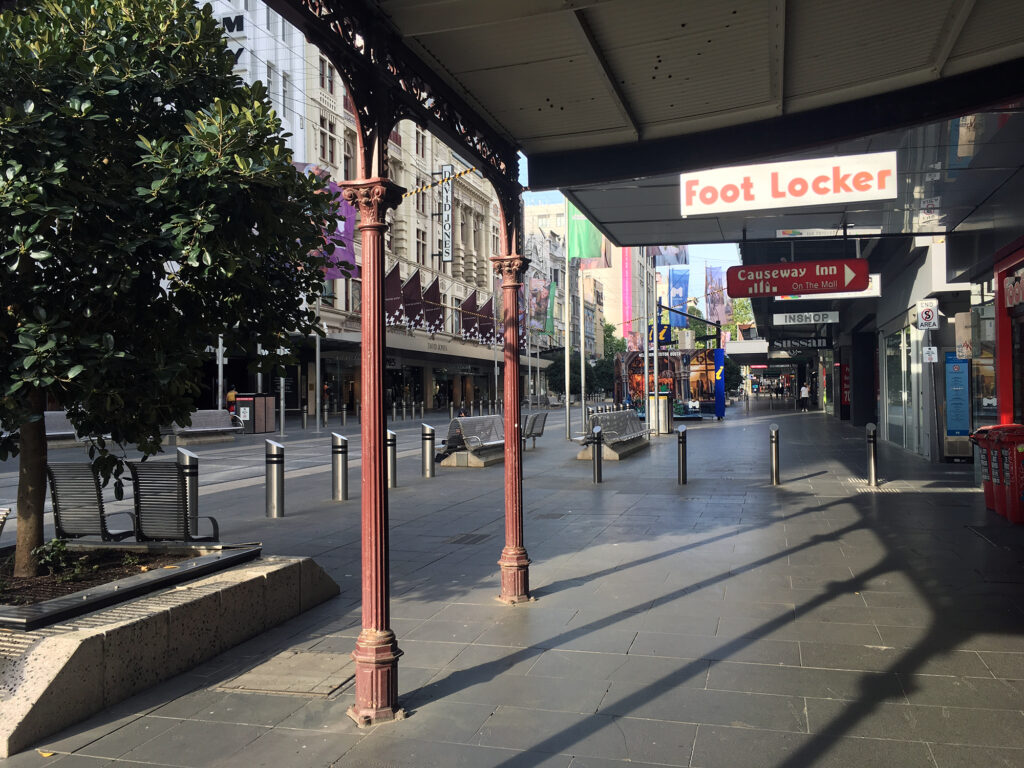 A deserted Bourke Street Mall on a Friday night during COVID-19 lockdown, Melbourne. Photo: Phillip Mallis